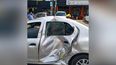 El automóvil fue impactado por un colectivo de la línea 203.