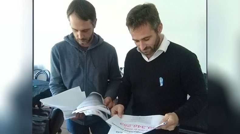 DOCUMENTOS. Laurent y Achával repasan los números de la seguridad..