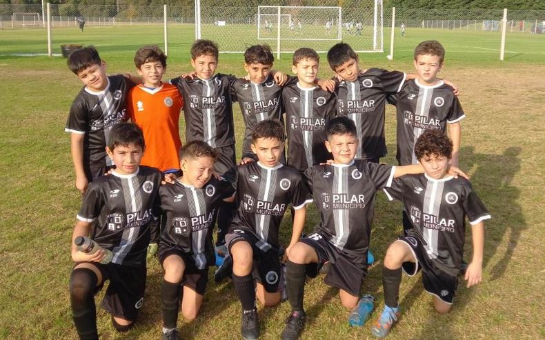 El equipo de la división 2014 del Monarca, que disputó su encuentro ante San Miguel.