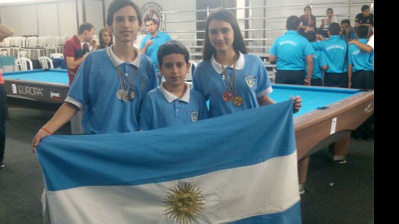 Ignacio, Braian y Julieta Block, tras competir en los Juegos Panamericanos de Medellín..