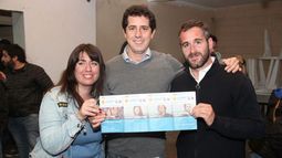 BOLETA. Portos, De Pedro y Achával, durante el acto de anoche..
