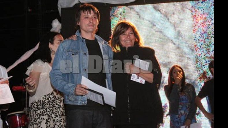 Santiago Leggio, de Elipas, con María Claudia Defante, de la Galería Phos..