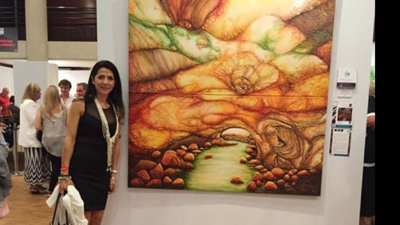 “MI SUEÑO”. Berrios, junto a su obra, en el Louvre..