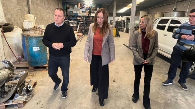 RECORRIDA. Vidal y Cáceres estuvieron con empresarios con la economía en agenda..
