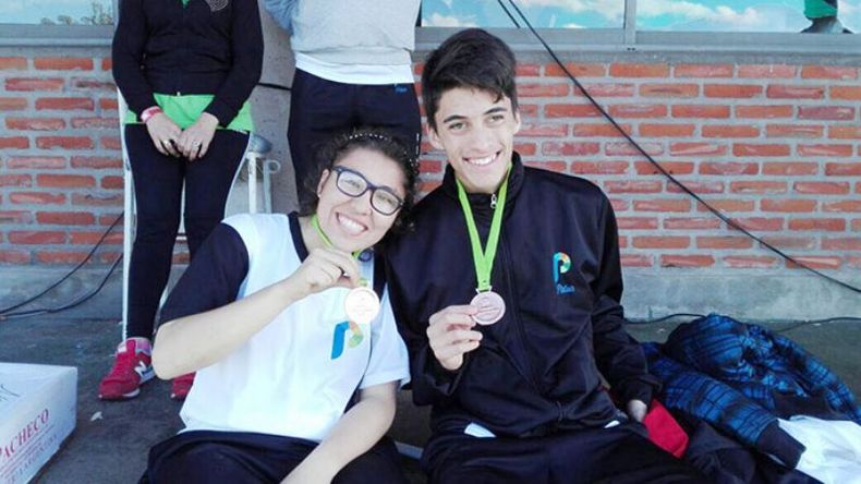 Rosario Del Río y Franco Núñez, dos de los medallistas del súper lunes. .