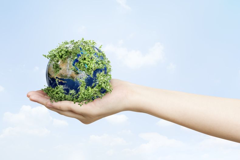 mano-ecologista-vida-sostenible-sosteniendo-tierra-verde.jpg