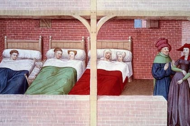 Un dormitorio medieval, según una ilustración de 1450. (Getty Images)..png