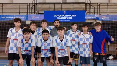 CAMPEONES. Los chicos de la Escuela Comunitaria de Astolfi ganadores de la Sub 14.