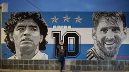 José Pignotti con el mural que pintó esta semana en Colón, Buenos Aires. José Pignotti con el mural que pintó esta semana en Colón, Buenos Aires.