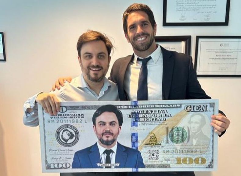 DOLARIZAR. Juan Martín Tito, junto a Ramiro Marra, candidato porteño de Milei.