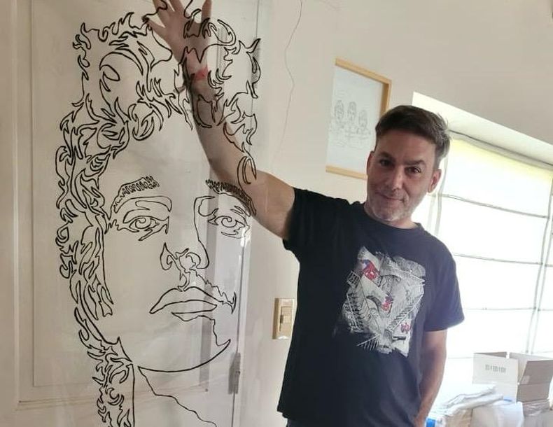 CERATI. Uno de los música retratado por Lisandro Aguilera.