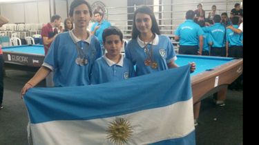 Ignacio, Braian y Julieta Block, tras competir en los Juegos Panamericanos de Medellín..