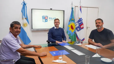 PARITARIAS. Molina, en una negociación con Federico Achával y Santiago Laurent.&nbsp;