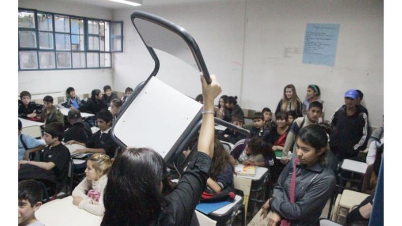 PROTAGONISTAS. Los pibes son los protagonistas en medios de las disputas..