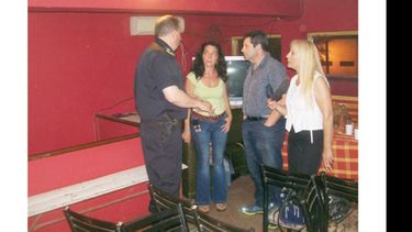 Representantes del foro, el comercio y la policía, durante la reunión..